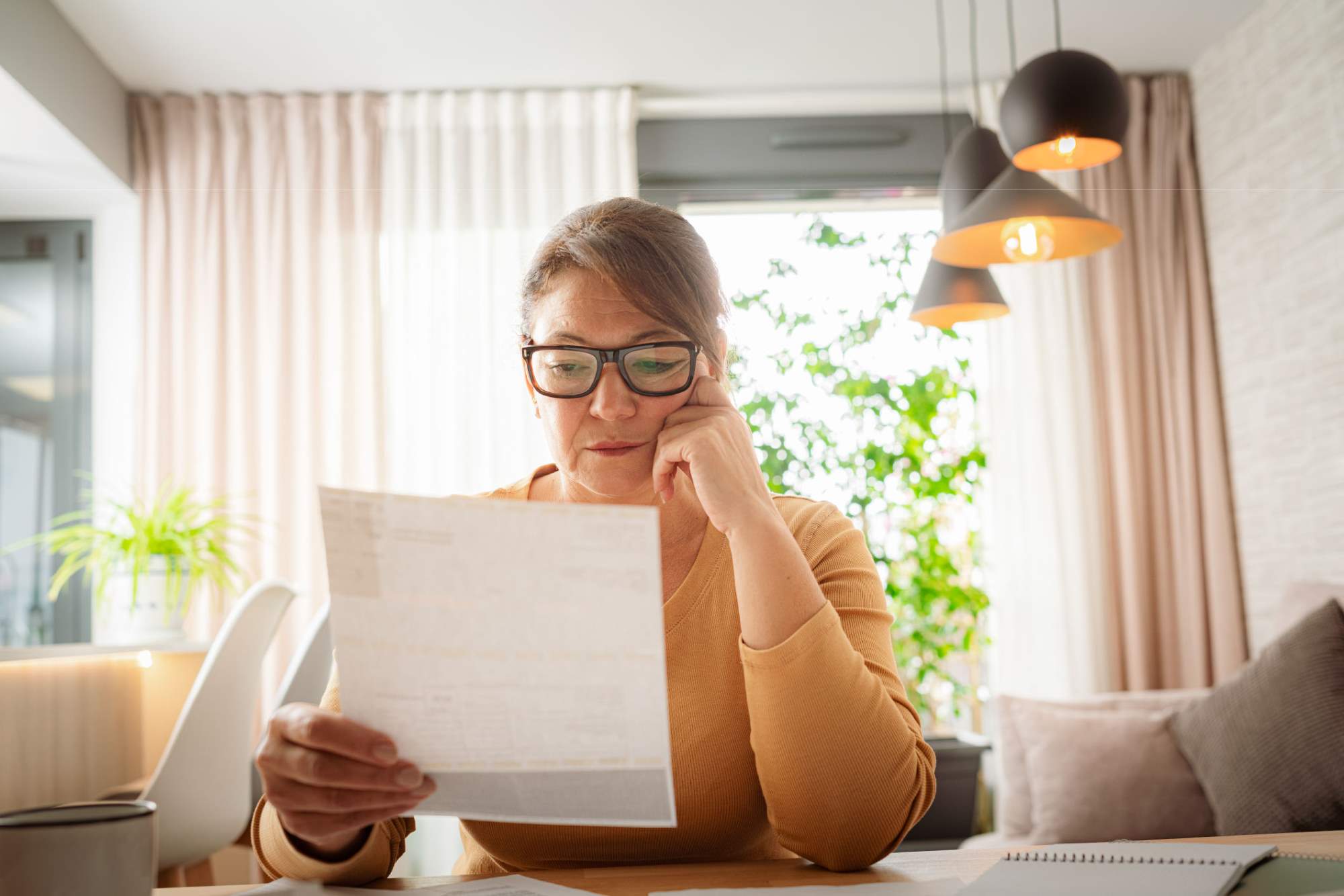 a woman looking at her post-divorce to-do list